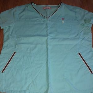 Light blue and brown detailed scrub top